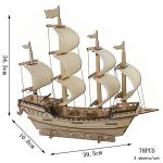 Träfartyg med tygsegel, modell av piratskepp eller gammalt fartyg, samlarobjekt, perfekt för en maritim eller nautisk inredning.