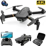 Quadcopter-drönare med 4K-kamera, kontroller och förvaringsväska, idealisk för flygfotografi och videografi.