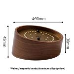 Lägg särskild vikt vid denna träur med magnetiska kulor, designad i gult aluminiumlegering, som mäter 45 mm hög och 90 mm i diameter, idealisk för vetenskaplig inredning.