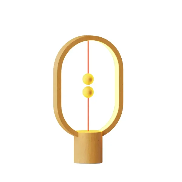 Modern designlampa inspirerad av fysik, med två gula sfärer hängande i en träram, perfekt för vetenskaplig dekoration.