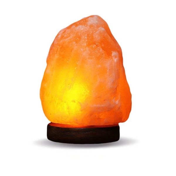 Upplyst Himalayasaltlampa, perfekt för inredning och avslappnande atmosfär.