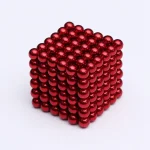 Röda magnetkulor som bildar en 3D-pyramid, perfekta för vetenskaplig dekoration eller utbildande experiment.