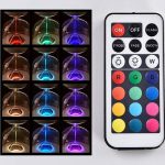 Ljusvas med flerfärgade LED-lampor som styrs med fjärrkontroll, som skapar en färgglad och modern atmosfär. Perfekt för inredning eller som ett lysande vetenskapligt objekt.