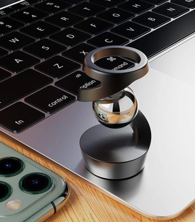 Teknologiskt tillbehör i form av ett förstoringsglas för smartphone och dator, perfekt för vetenskap och teknik.
