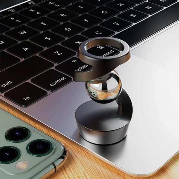 Teknologiskt tillbehör i form av ett förstoringsglas för smartphone och dator, perfekt för vetenskap och teknik.