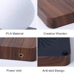 Vetenskaplig dekorativ del i trä med plastbas, utrustad med en strömkälla och halkfri design, idealisk för en modern och originell dekoration.