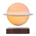 Saturnus i vetenskaplig dekoration, lysande lampa som representerar planeten med ringar, idealisk för en originell och utbildande dekoration.