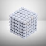 Kub av vita plastkulor, vetenskaplig modell för experiment och utbildningsdemonstrationer.