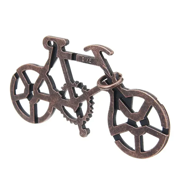 Nyckelring eller dekorationsobjekt i form av cykel i metall, idealisk för vetenskaps- och industriell designentusiaster.