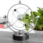 Bohr-atommodell i metall med elektroner som kretsar runt kärnan, idealisk för vetenskaplig eller utbildande dekoration.