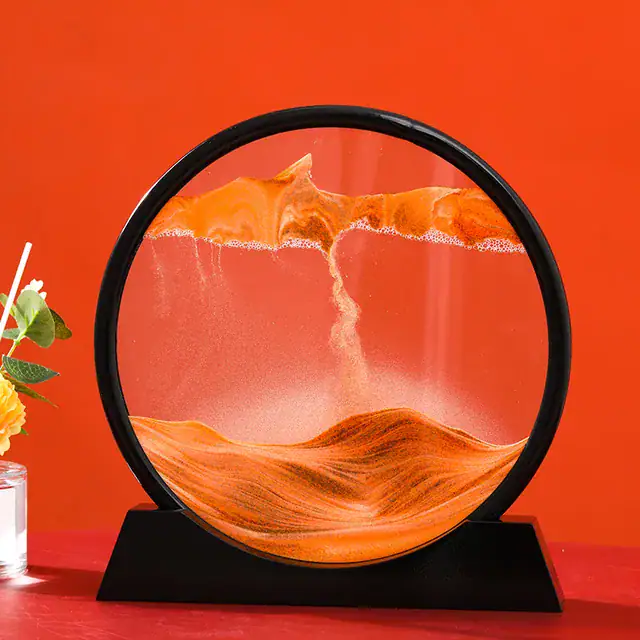 Glasföremål med orange sand, elegant och modern vetenskaplig dekoration, perfekt för inredning eller som samlarobjekt.