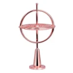 Astrolabium balans i roséguld, elegant och vintage vetenskaplig dekoration. Perfekt för astronomi- och sofistikerad inredningsentusiast.