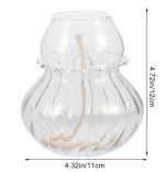 Transparent glasvas med ett skelett av en orm inuti, perfekt för vetenskaplig eller laboratoriedekoration.