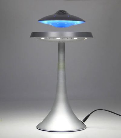 Modern skrivbordslampa inspirerad av ett vetenskapligt objekt med lugnande blått ljus och elegant design. Perfekt för en arbetsplats eller innovativ inredning.