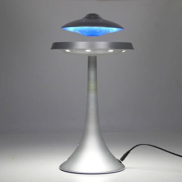 Modern skrivbordslampa inspirerad av ett vetenskapligt objekt med lugnande blått ljus och elegant design. Perfekt för en arbetsplats eller innovativ inredning.