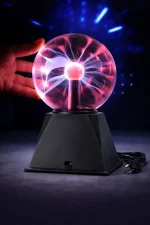 Taktile plasma-lampa på 25 cm med interaktiva ljuseffekter. Perfekt för vetenskaplig och modern dekoration, denna lampa skapar imponerande visuella effekter tack vare sina elektriska urladdningar.