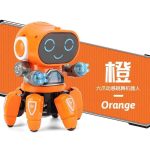 Utbildningsrobot i orange med digitalt leende ansikte, rörliga armar i genomskinlig plast och robusta ben, idealisk för att stimulera vetenskaplig nyfikenhet.