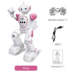 Utbildningsrobot för barn med fjärrkontroll, USB-kabel och instruktioner, i rosa färg.