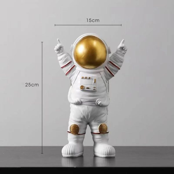 Dekorativ vas i form av en astronaut med gyllene hjälm, idealisk för inredning, 25 cm hög och 15 cm bred, som ger en vetenskaplig och lekfull touch till ditt utrymme.