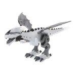 Modell av en robotisk T-Rex-dinosaur i vit och grå plast, med rörliga detaljer och vingar, perfekt för vetenskaplig eller pedagogisk dekoration.