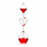 Pipett med röd vätska, en vetenskaplig dekoration i glas, perfekt för kontorsinredning eller ett vetenskapsrum.