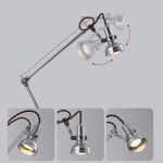 Industriell skrivbordslampa i metall med ledad arm, perfekt för exakt belysning och vintage-design. Perfekt för ett kontor eller modernt arbetsutrymme.