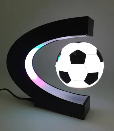 LED-lampa i form av fotboll och måne, modern dekoration för rum eller vardagsrum.