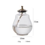 Transparent kryddburk i glas med metallock, kapacitet på 100 ml, höjd 7,7 cm, idealisk för köket eller vetenskaplig dekoration.