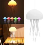 Dekorativ lampa i form av en manet med lysande tentakler, tillgänglig i flera färger för modern och originell inredning.