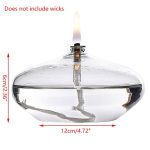 Transparent glasvas med tänd låga, idealisk för laboratoriedekoration eller vetenskaplig atmosfär. Mått: 12 cm bred, 6 cm hög, elegant och modern design.