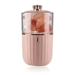Salt- och pepparkvarn i form av en rosa kapsel, elegant och praktisk, idealisk för köks- eller borddekoration med en vetenskaplig eller modern stil.