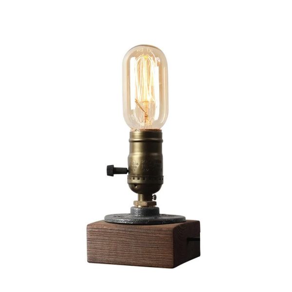 AMPoule vintage industriell belysning i glas med synligt filament, på en träfot för industriell eller vetenskaplig dekoration.