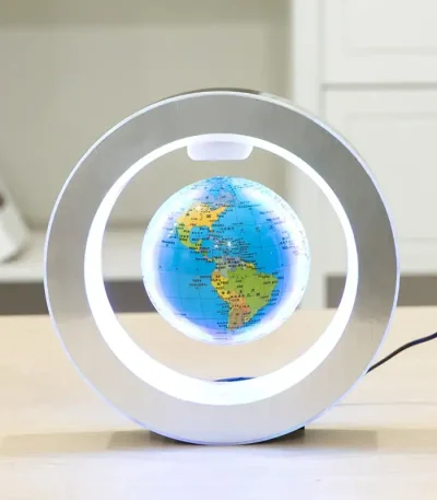 Skrivbordslampa med lysande jordglob, modern och utbildande design, idealisk för vetenskaplig inredning och lärande.