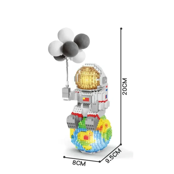 Robot i LEGO-block med ballonger och planeten Jorden, lekfull vetenskaplig dekoration.