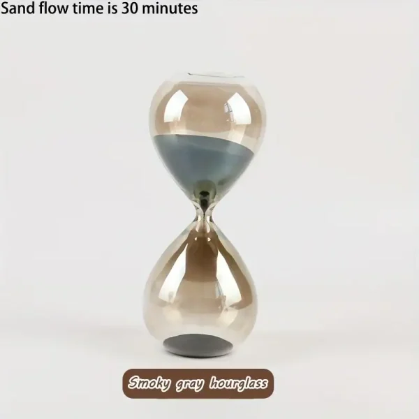 Glasst timglas med rökgrå sand, illustrerar ett sandflöde på 30 minuter. Perfekt för vetenskaplig dekoration eller som ett unikt samlarobjekt.