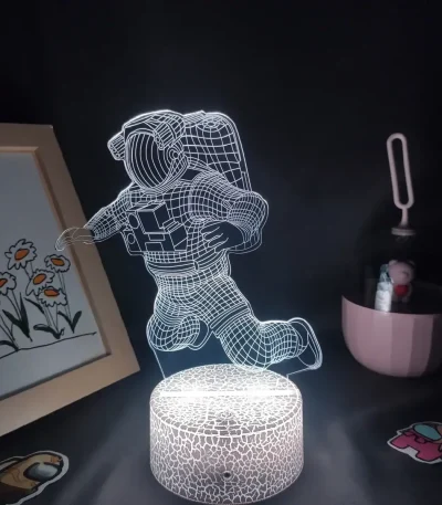 3D-LED-lampa som föreställer en astronaut i flyg.