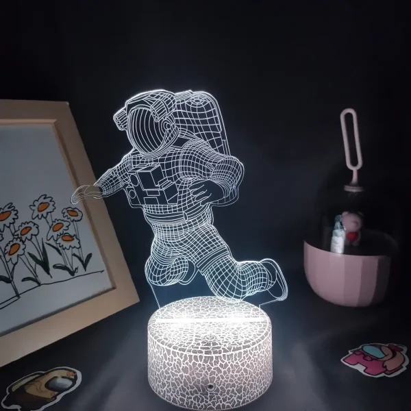 3D-LED-lampa som föreställer en astronaut i flyg.