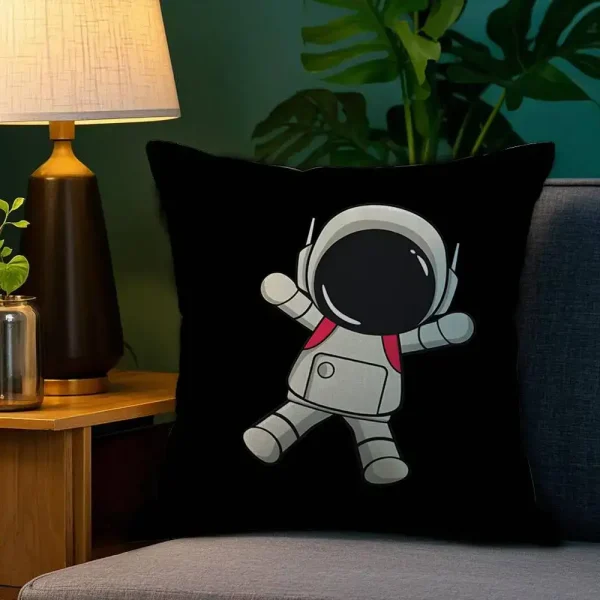 Kudde med motiv av en astronaut i rymddräkt, perfekt för inredning.