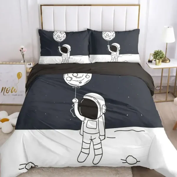 Sängkläder med astronaut- och månmotiv, perfekta för en barn- eller tonårsrum inspirerad av rymden och vetenskapen.