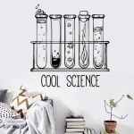 Illustration av provrör med bubblor och stjärnor, som representerar vetenskap, med texten "Cool Science" nedanför, väggdekoration för ett vetenskapligt eller utbildningsutrymme.