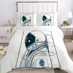 Sängkläder med astronaut- och planetmotiv, perfekt för en rymdtema inredning. Bekväm och stilren, idealisk för rymdentusiaster och utforskare.