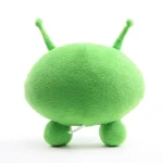Grön alien plysch i form av ett vetenskapligt objekt, mjuk och söt, perfekt för dekoration eller som en originell present.