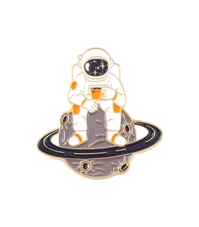 Pin's av astronaut i rymden med planet och stjärnor.