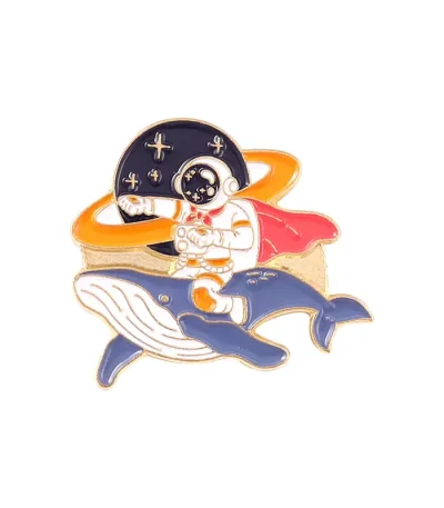 Pin's av astronaut och val, vetenskaplig och marin dekoration.
