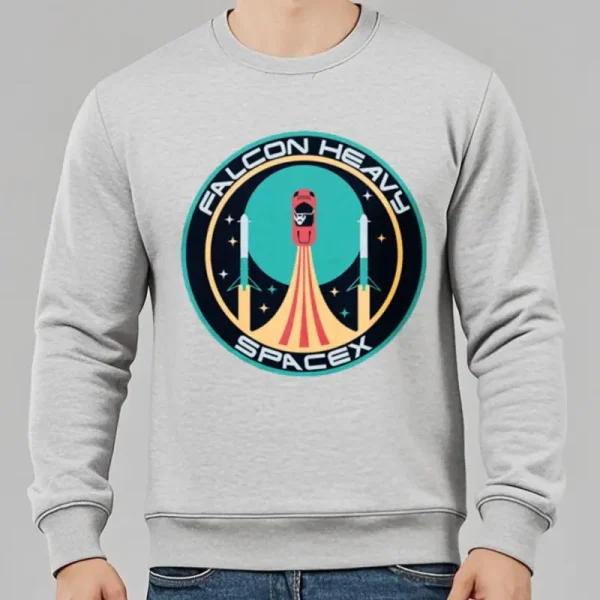 Grå sweatshirt med Falcon Heavy SpaceX-logotyp, illustration av en raket i uppskjutning i en modern grafisk stil, idealisk för rymd- och teknikentusiaster.