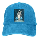 Denimkeps med illustrerad astronautlogotyp, perfekt för vetenskaps- och rymdutforskningentusiaster.