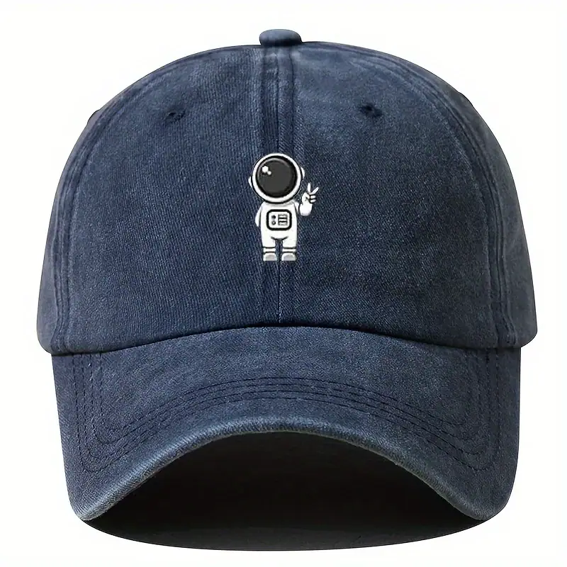 Denimkeps med tecknad astronautlogotyp, idealisk för vetenskaps- och astronomientusiaster, perfekt för en avslappnad och originell stil.