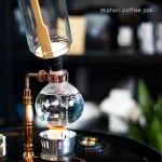 Siphon kaffeburk i glas med kopparsystem, perfekt för vetenskaplig dekoration eller för att brygga siphon-kaffe hemma.