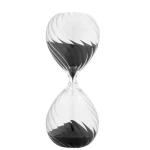 Vetenskaplig timglas i svart och vitt glas, elegant design, symbol för tid och precision, perfekt för kontors- eller studiemiljö.