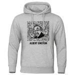Grå hoodie med humoristisk illustration av Albert Einstein som gör en fredsgest, omgiven av matematiska och vetenskapliga formler.